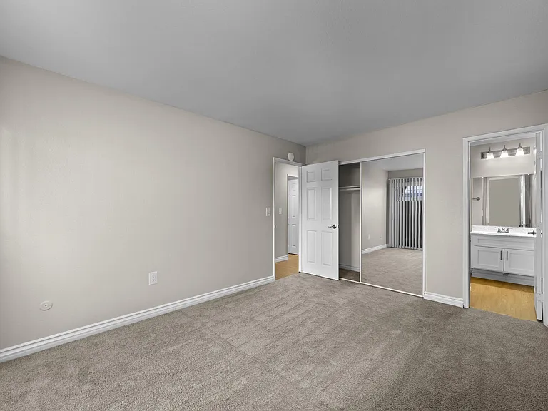 Apartment bedroom and large closet at Strada Apartments in Orange, CA
