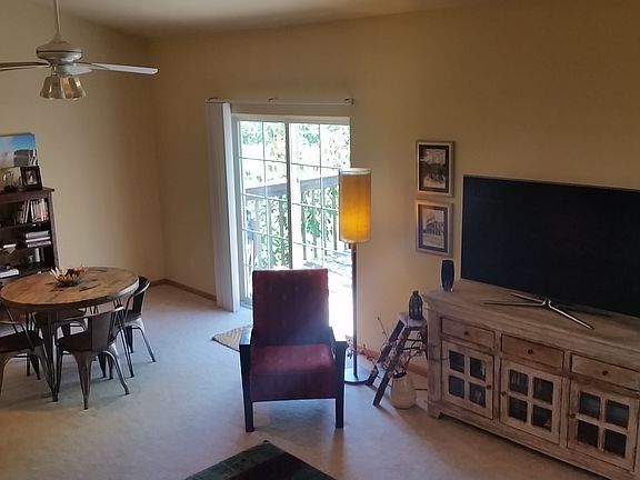 Patio doors to gorgeous backyard and deck