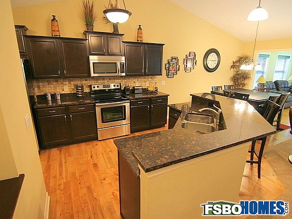 Kitchen with Elevated Countertop On The Island