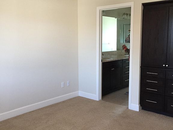 large master suite w built in drawers / cabinetry 