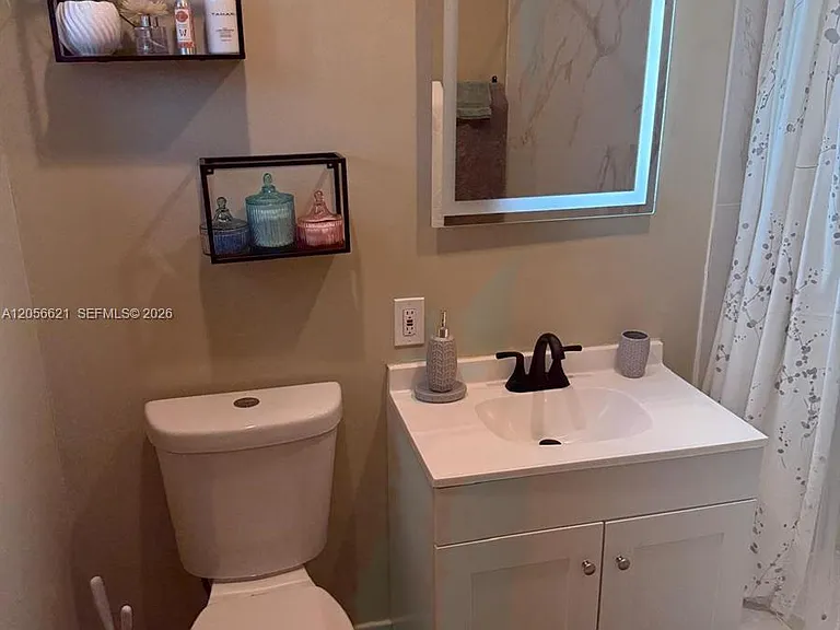 940 NE 155th Ter — Photo 27