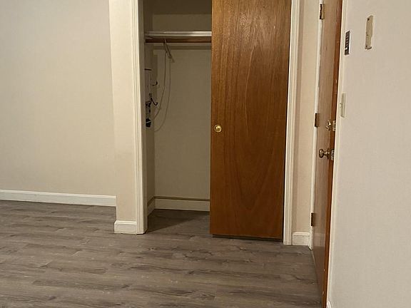 Closet in dining room and other exit door .