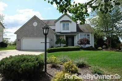 Charming!!
						:
						Stone front on garage, stamped driveway and sidewalk leading up to the house.