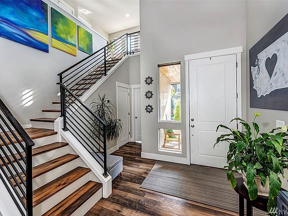 Soaring ceilings greet you as you enter the front door.