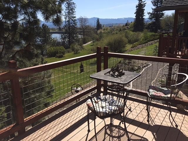 Deck with view of river and mountains