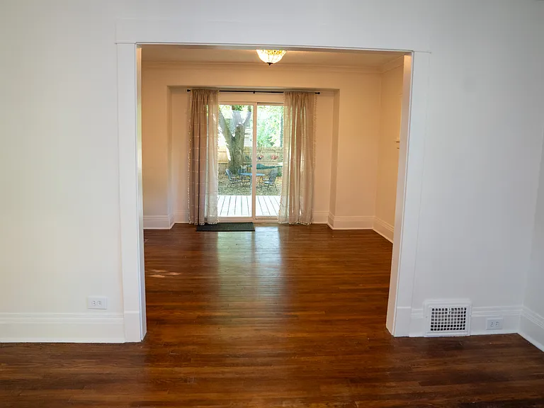 looking through dinning room out to the deck