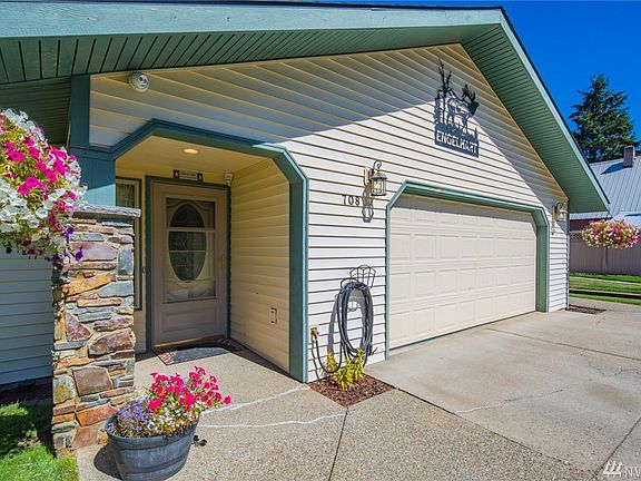 Great covered porch entrance and eye appealing stone detailed pillar.