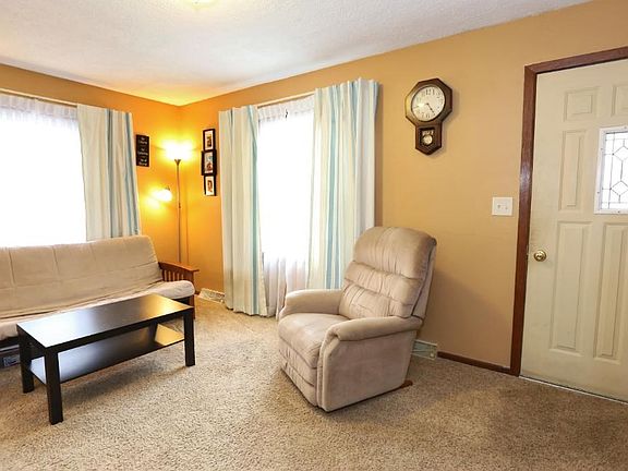 ...and a west facing window overlooking the front yard at the right. A coat closet is also at right. All main level windows are maintenance-free.