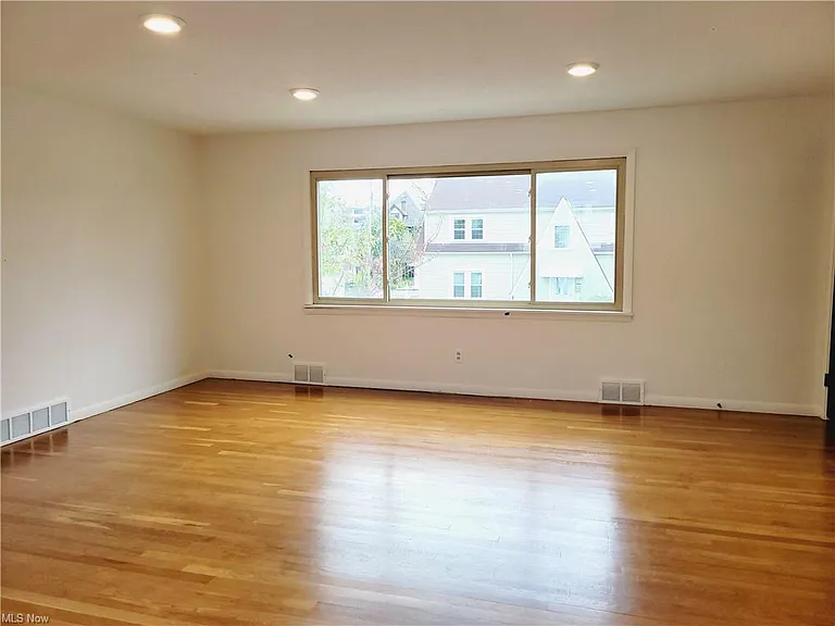 Beautiful original hardwood throughout living area.