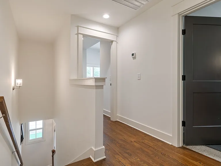 Upstairs, you'll find the primary suite, plus two additional bedrooms and a full bathroom.