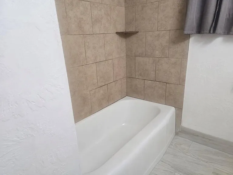 7702 Claiborne St — Photo 10