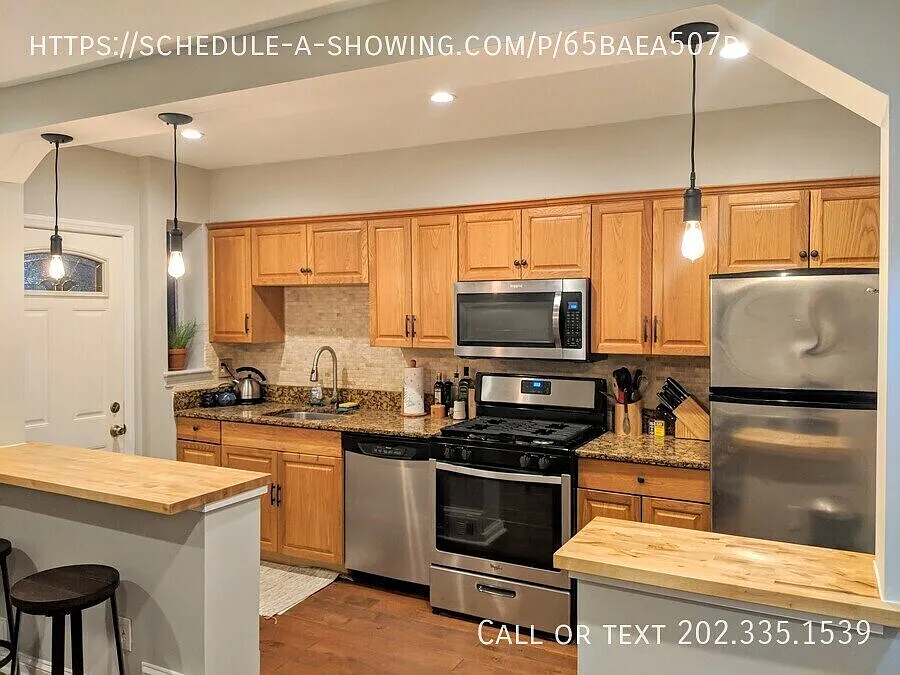 Two-Level 2BR + Bonus Room with Parking & In-Unit Laundry — Photo 3