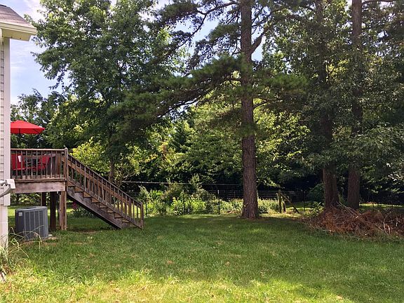 Private backyard with plenty of room for kids to play.