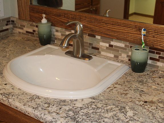 Remolded Master Bath
						:
						Granite His & Hers Lavatories
