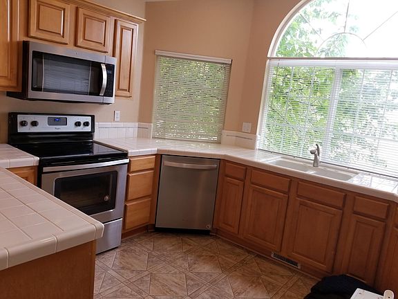 Microwave, Dishwasher, Stove and Fridge ALL NEW! Stainless!