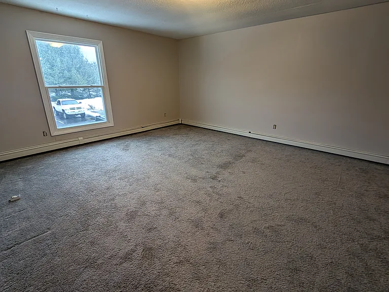 large carpeted bedroom