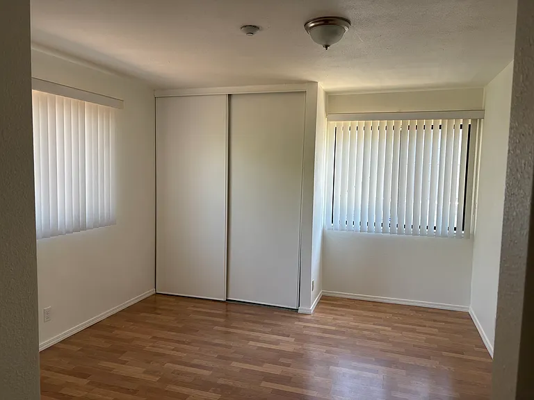 Master bedroom with primary closet