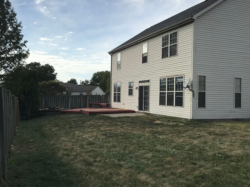 Front View of house and back yard