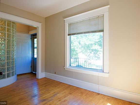 Bedroom 1 with private bathroom and front porch access