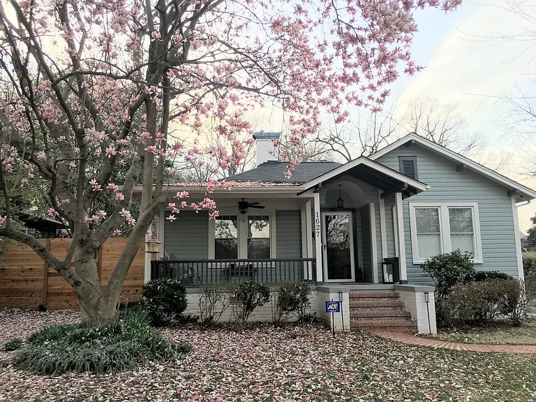 View of home when front tree is in bloom