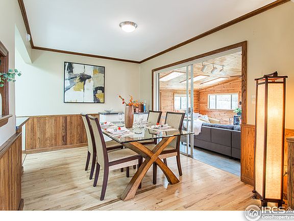 Dining rooms opens to kitchen and family room