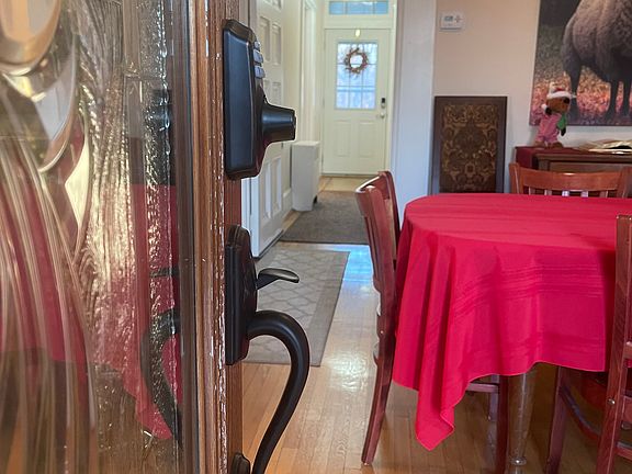 Front door opens into a comfortable foyer and straight through hall to the back door