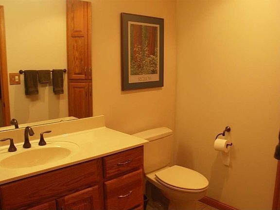 "The half bath is centrally located off of the garage and kitchen."