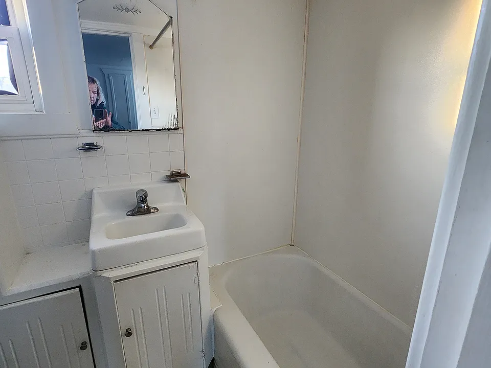 Sink, bathtub, closet and toilet are small....but adequate. These appliances share their space with the electric hot water heater.