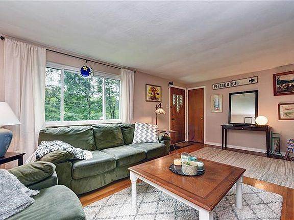Living room towards coat closet.