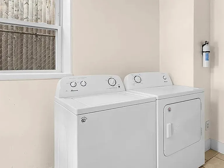 First floor laundry with full size washer & dryer.