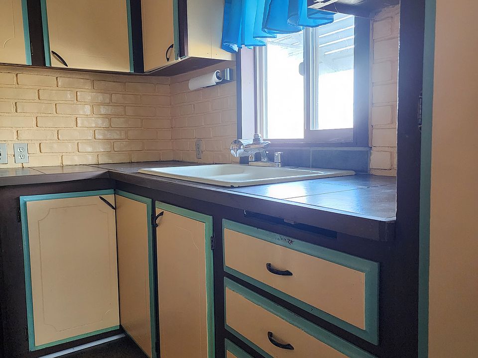 Kitchen sink and cabinets
