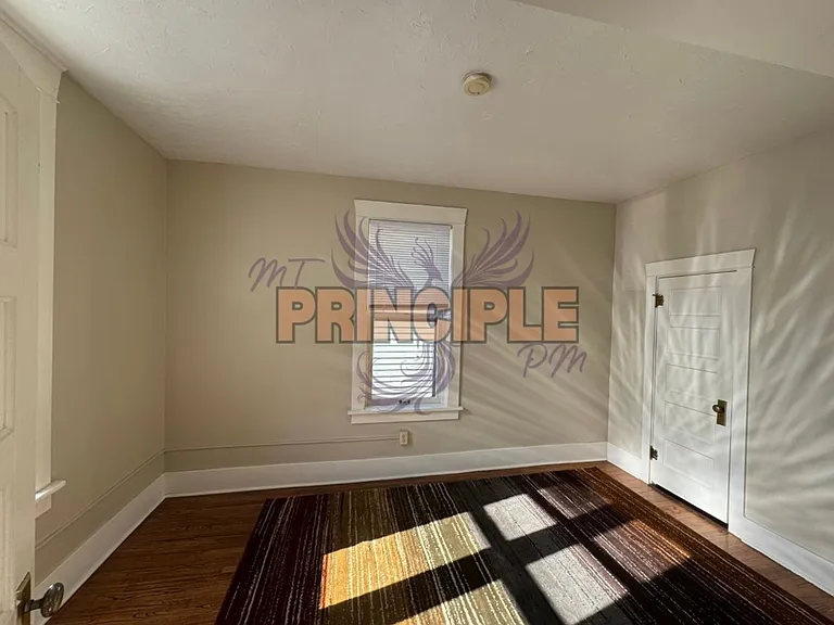 214 E 3rd St — Photo 7