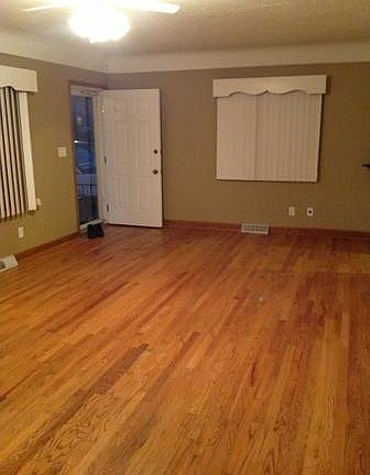 living room view 2 with ceiling fan