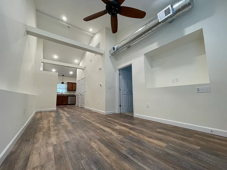 Living room, dining room, kitchen.