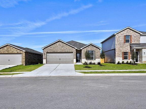 The Fannin is a charming single-story home with an attached 2-car garage.