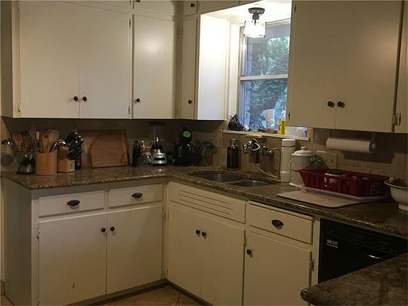 Spacious kitchen has dishwasher and refrigerator