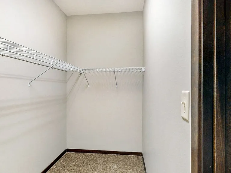 Large walk-in closets offer plenty of space to keep your wardrobe organized.