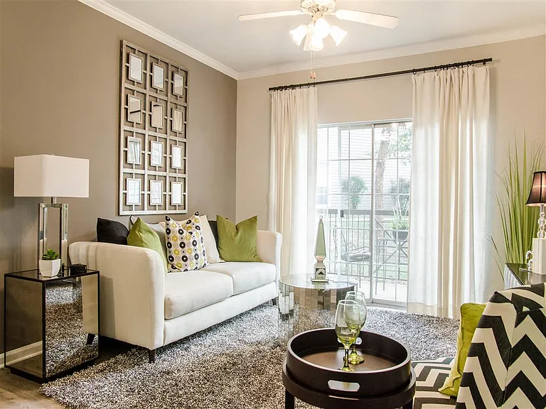 Open Space Living Room with Hardwood Floor and Stylish Interior Showing Natural Light