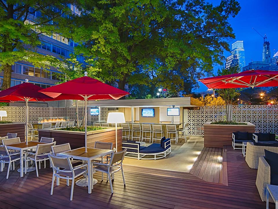 Meet up with friends at the Skyline Lounge with outdoor TV's, bar area, and fire pit