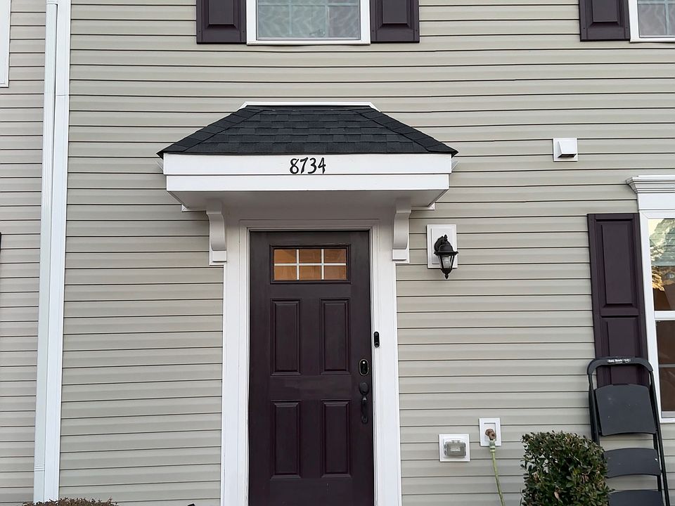 Welcoming front entrance with private entry, well-maintained exterior, and quiet community setting
