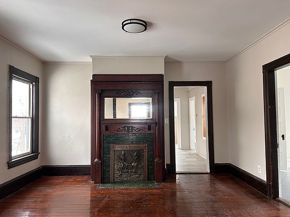 Living area two that connects to bedroom one and kitchen