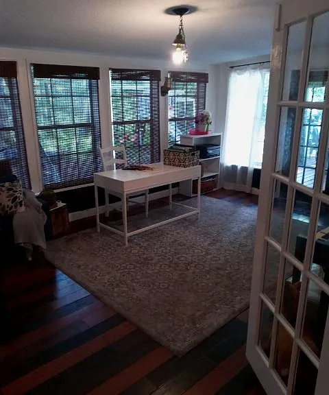 Air conditioned sunroom, bonus room, office or family room some have used it as a dining room or game room with a pool table plenty big enough