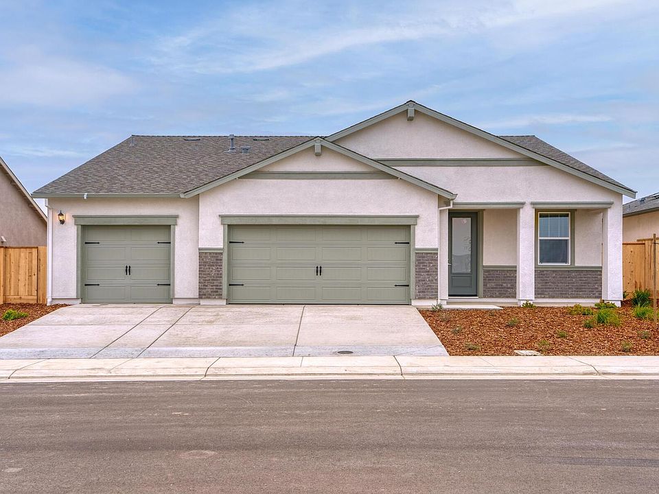 The Sonoma is a beautiful home of stucco and stone.