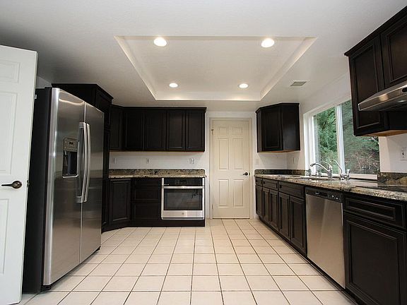 NEW oven, NEW dishwasher, NEW refrigerator and inductive stove, NEWLY REPOLISHED Cabinets and NEW recess lights.