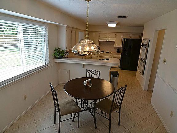 Breakfast area and view of kitchen