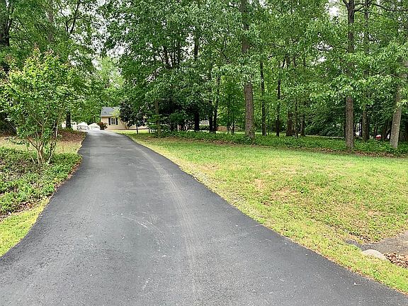 Paved circle driveway 