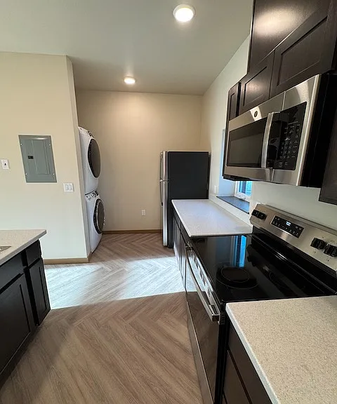 Kitchen, showing Washer/Dryer in each unit