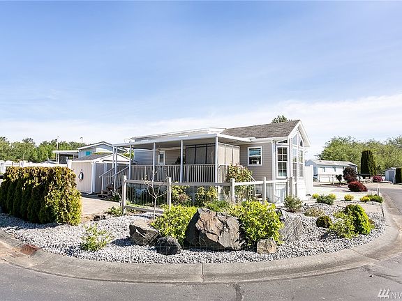 #271 is a lovely corner lot with easy landscaping.