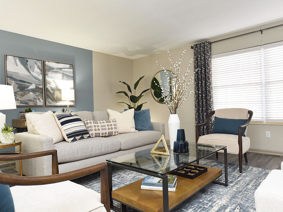 Experience tranquility in this elegantly designed living room, perfect for relaxation and entertaining.