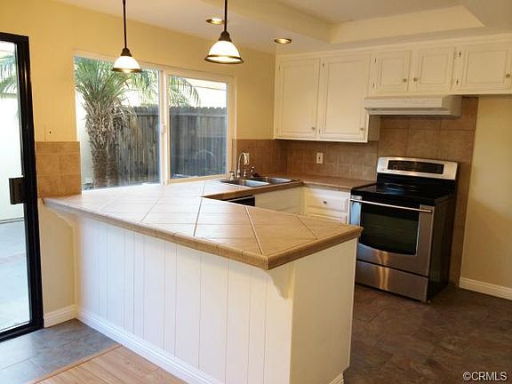4th image of 9868 Karmont Ave